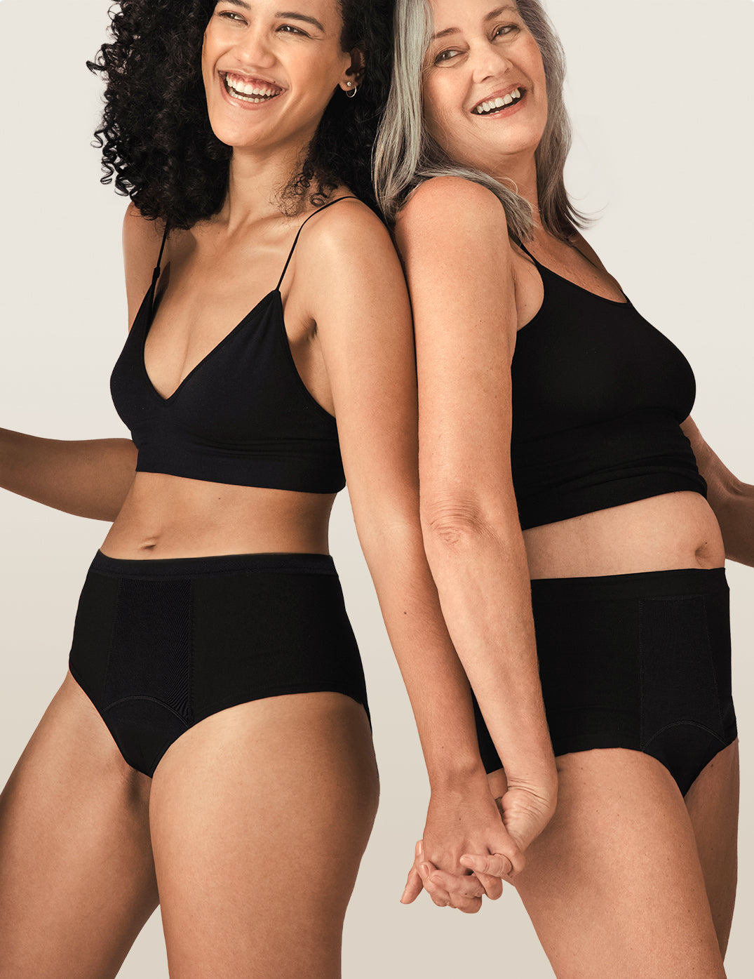 Two women wearing sleaks midnight brief underwear
