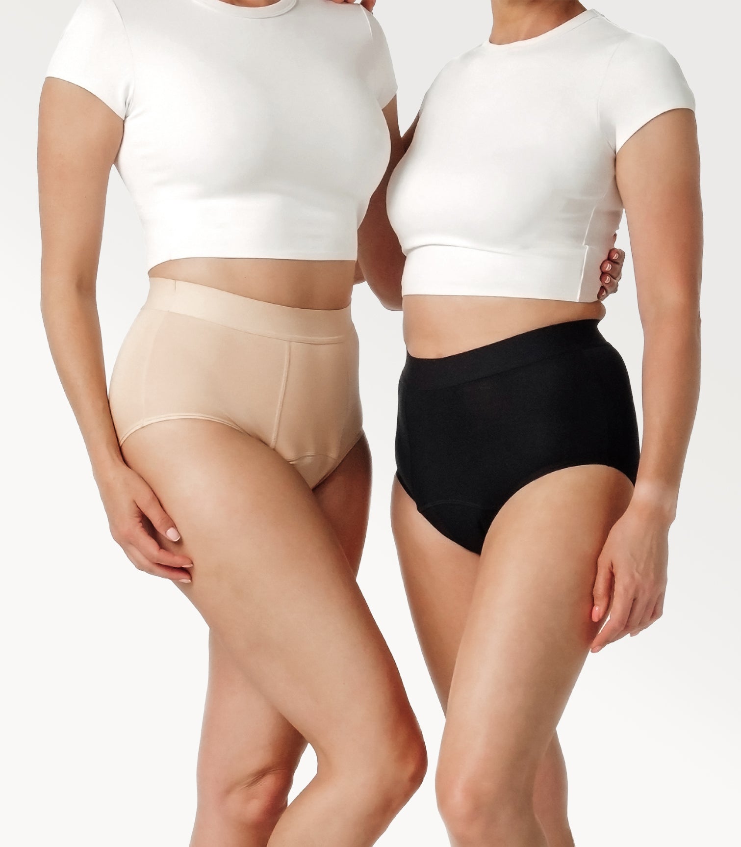 Two people wearing sleaks high-waisted underwear in bare and midnight color